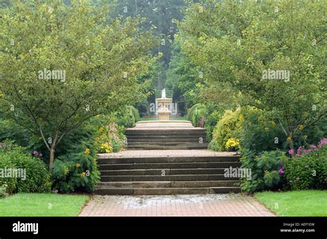 Sidewalk Path Through Public Gardens Stock Photo Alamy