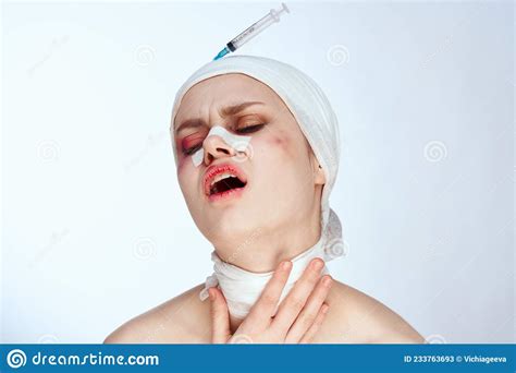 woman bandaged face the syringe sticks out in the head light background stock image image of