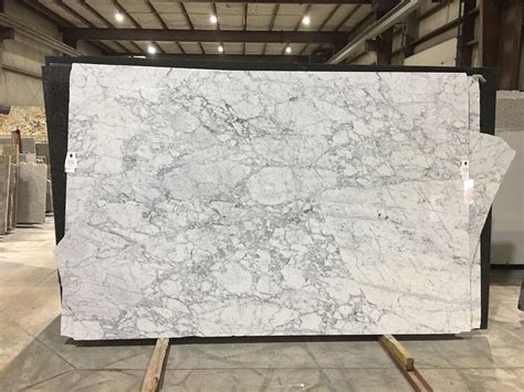 White Marble Is Being Displayed In A Warehouse