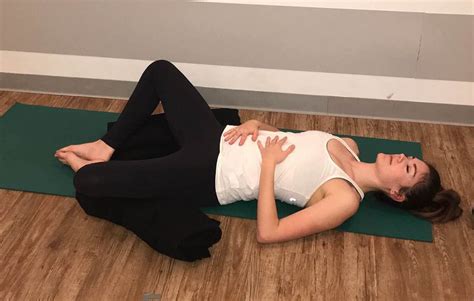 This Stretching Routine Will Help You Sleep Betterand You Can Do It In