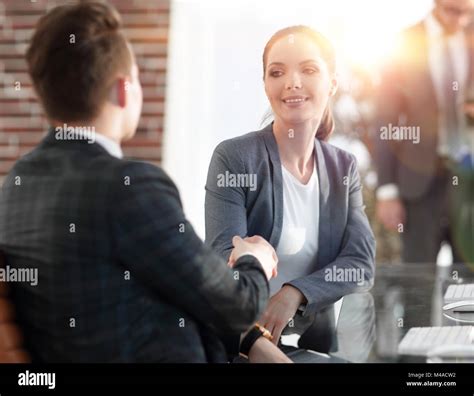 Handshake Manager And The Client In The Office Stock Photo Alamy