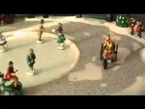 Simply place this on your mantle place under your tree or on a display table for the holidays. Mr. Christmas Musical Skating Rink Holiday Decoration.wmv ...