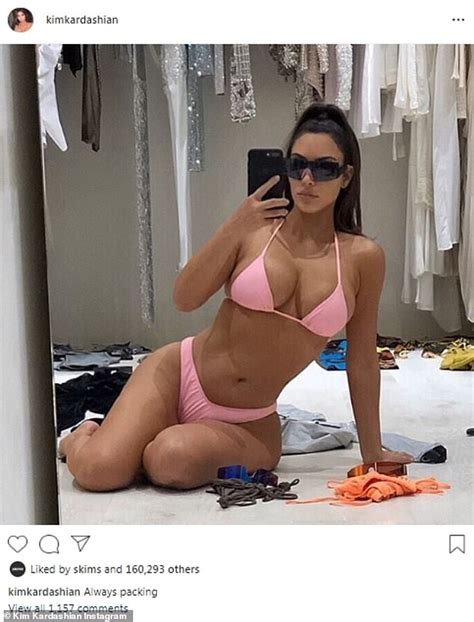 kim kardashian oozes sex appeal in bubblegum pink bikini as she poses in walk in closet daily