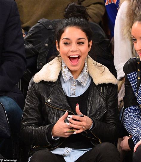 Vanessa Hudgens Sucks On A Lollipop As She Catches A Basketball Game