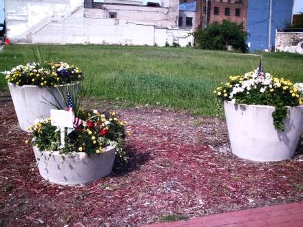 On the street of south washington avenue and street number is 3327. Saginaw, MI : Flowers help to spruce up downtown. photo ...