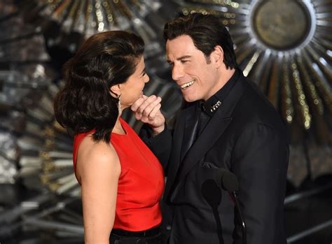 John Travolta & Idina Menzel Joke At Oscars About That Adele Dazeem