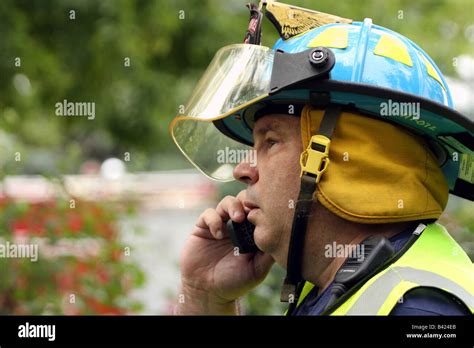 An Emt On A Cell Phone Stock Photo Alamy