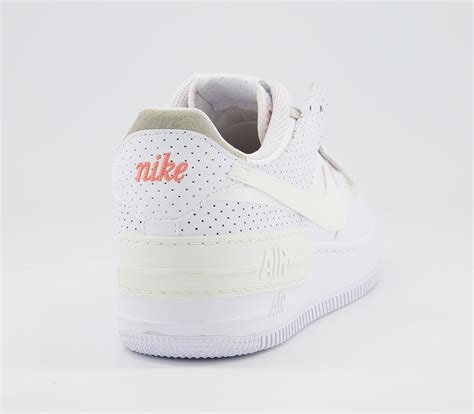 The nike swooshes are sitting on top of each other, while the exaggerated stacked midsole features an 'air' tab to the side. Nike Air Force 1 Shadow Trainers White Sail Stone Atomic ...