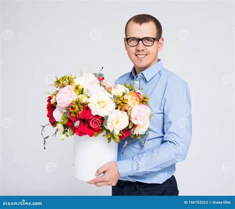 Valentine`s Day Concept Portrait Of Young Handsome Man With Flowers Box Stock Image Image Of