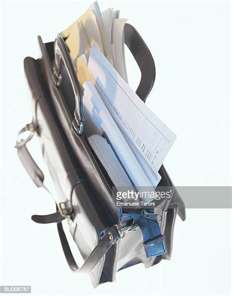 Overstuffed Briefcase Photos And Premium High Res Pictures Getty Images