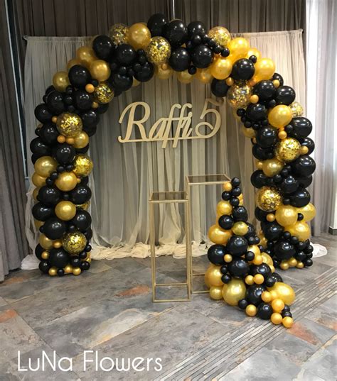 Gold And Black Balloon Arch In 2021 Black And Gold Balloons Yellow
