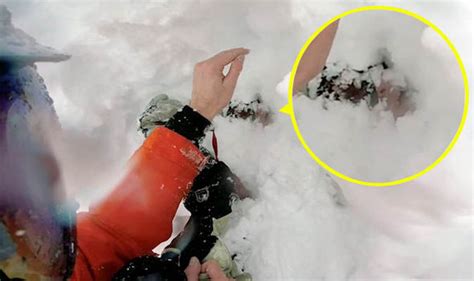 Snowboarder Is Rescued After Being Buried Under Snow In This Clip