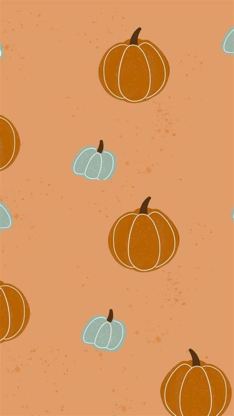 An Orange Background With Pumpkins On It