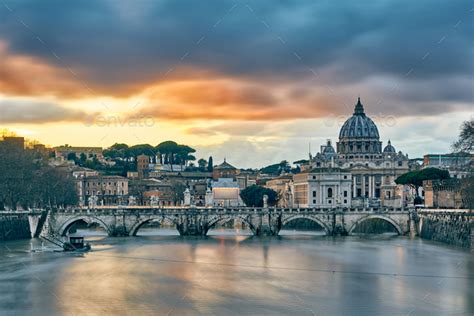 St Peters Cathedral And Tiber River At Evening In Rome Stock Photo By