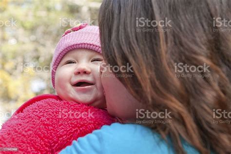 Mom Kissing Baby Daugther Stock Photo Download Image Now Adult
