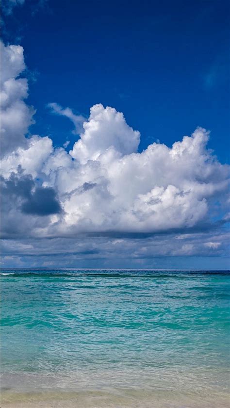 Beach Waves Calm Body Of Water Under White Clouds Blue Sky 4k Hd Ocean