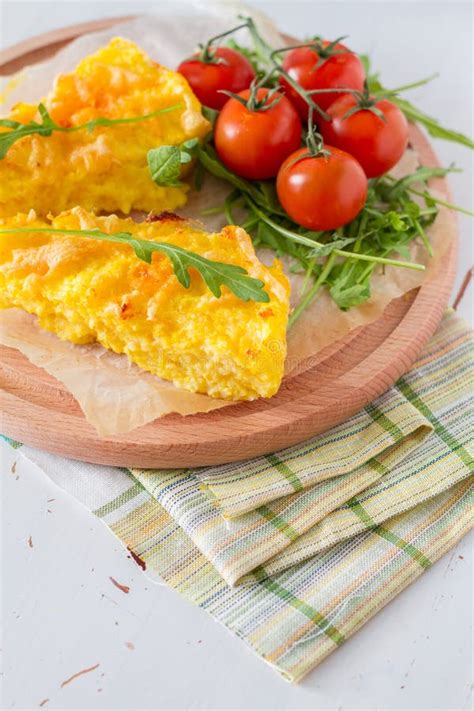 Polenta Served On Wood Board With Cherry Tomatoes Stock Photo Image