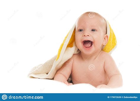 A Happy Satisfied Baby Toddler Newborn Baby Covered With A Towel