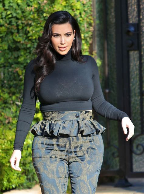 Maybe you would like to learn more about one of these? Kim Kardashian flashes her ever-growing baby bump in ...