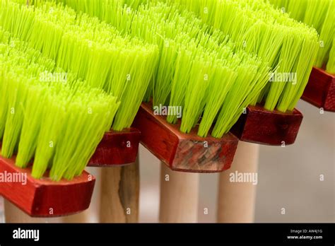Colorful Brooms For Sale At Garden Center Stock Photo Alamy