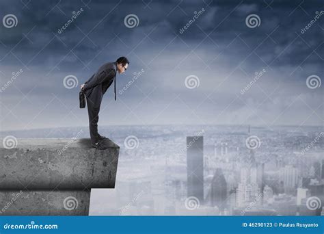 Businessman Standing On Rooftop And Look Down Stock Image Image Of