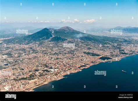 An Aerial View Of The Volcano Of Mount Vesuvius Towering Over The