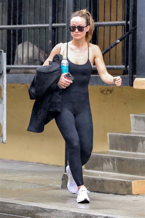 Olivia Wilde Shows Off Her Fit Physique In A Black Top And Leggings As