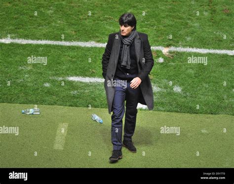 germany s coach joachim loew leaves the ground during the fifa world cup 2014 qualifying soccer