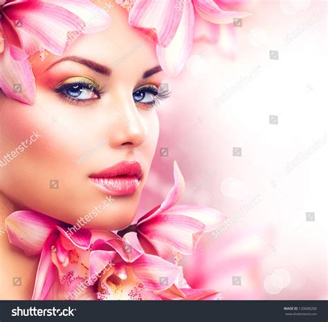 Beauty Girl With Orchid Flowersbeautiful Model Woman Face