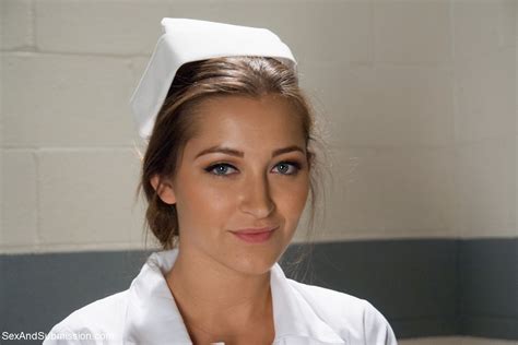 Gorgeous Nurse With A Nice Butt Dani Daniels Strips And Poses In High