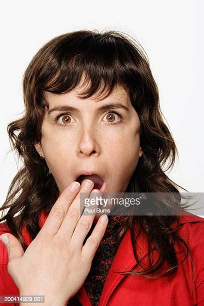 Woman Hand Over Mouth Surprise Photos And Premium High Res Pictures Getty Images