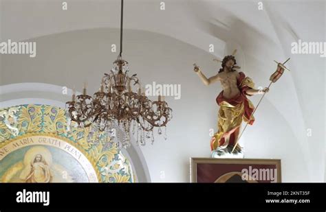 Statue Of Naked Jesus Christ In Robe Stands Under Vault Of The Church Stock Video Footage Alamy
