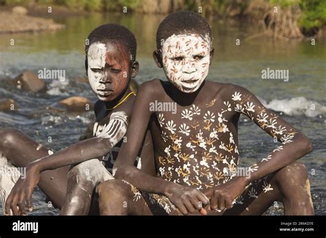 Surma Boys With Body Painting Face Painting In River Surma Tribe Kibish Omo Valley