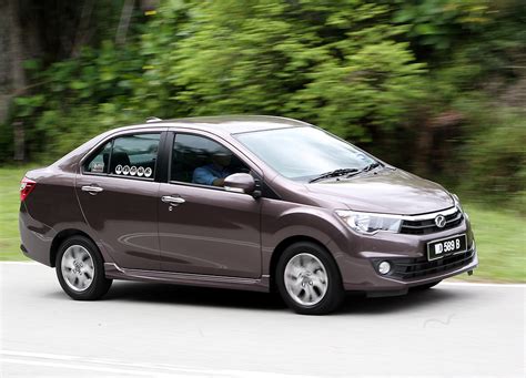 The head lamps are different than axia and uses halogen reflector. Perodua Bezza drives a good deal | CarSifu