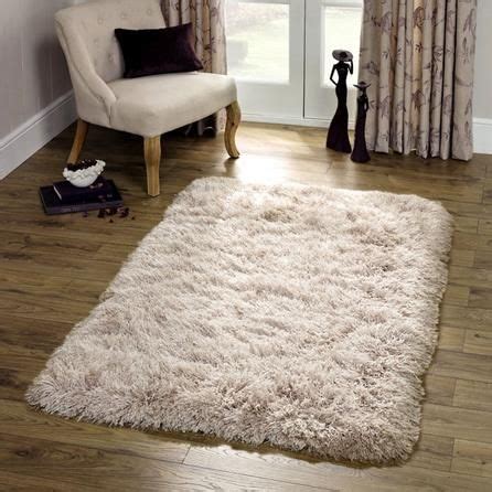 Colors include:multi, blue, ivory, light blue, light green, pink, gold. http://www.dunelm-mill.com/shop/divine-shaggy-rug-377279 In blue/grey for trunk/coffee table ...