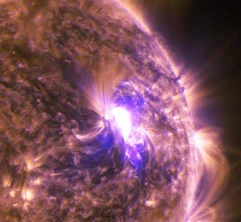 Nasas Sdo Sees Mid Level Solar Flare