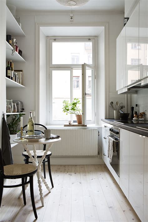 Narrow cabinets installed on the side of a cupboard or base cabinet can. Narrow Kitchen Design Ideas | InteriorHolic.com