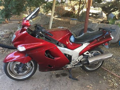 Bike is in excellent condition, clean and well cared for, always garaged, 11,360 miles, burgundy (wine) color, muzzy ss. 1997 Kawasaki Ninja Zx 11 Motorcycles for sale