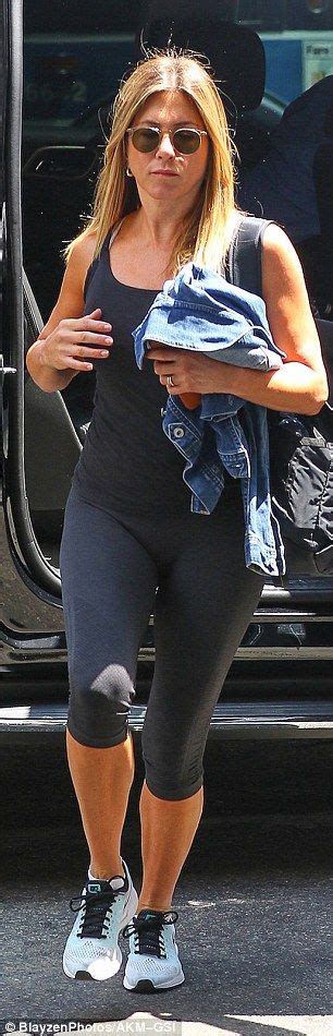 Jennifer Aniston Hits The Gym While Justin Theroux Cycles Around NYC