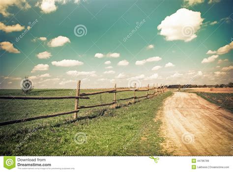 Sunny Day In Countryside Empty Rural Road At Summer Stock Image