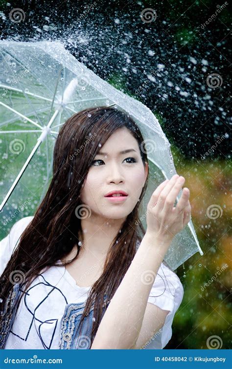 Beautiful Girl Is Standing With Umbrella Among Rain Stock Photo Image