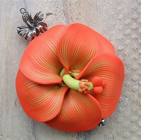 It's for gum paste or sugar craft. Coral Hibiscus Bead | Clay flowers, Polymer flowers ...