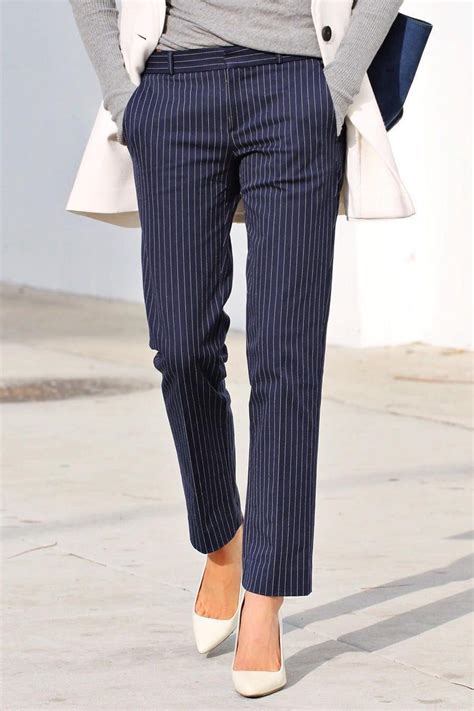 fifty two thursdays keeps her look classic in our navy and white pinstripe straight leg pan