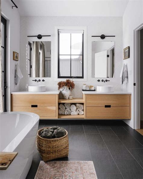 Light Wood Double Vanity With Black Bathroom Floor Soul Lane
