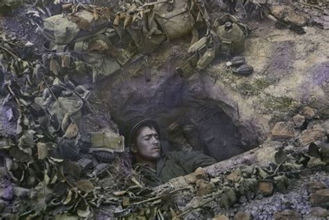 two u s infantrymen share a foxhole near frontlines after the allied invasion o glasshouse