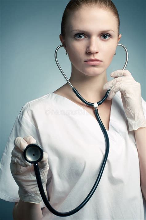 Portrait Of Young Medical Doctor Woman With Stethoscope Stock Photo