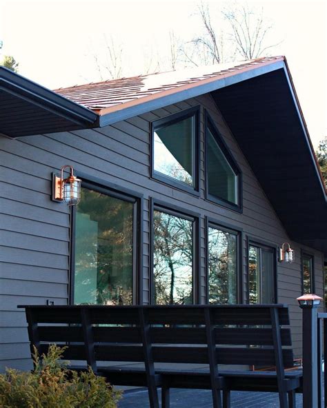 Dark And Moody House Exterior With Copper Roof And Copper Sconces Love