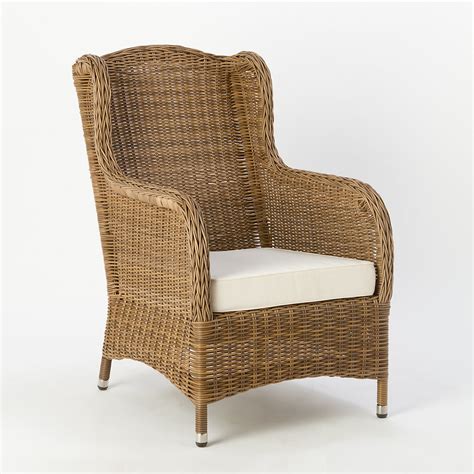 Stylish pair of hooded porters chairs or balloon chairs. All-Weather Wicker Wingback Chair | Terrain