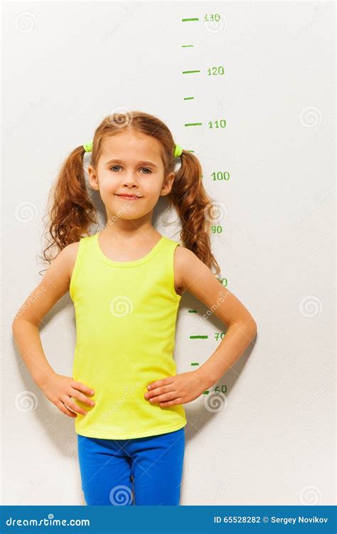Little Girl Stand By Measuring Height Scale Stock Photo Image Of