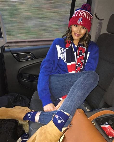 cute outfits for super bowl sunday from olivia culpo patriots beanie socks and scarf with